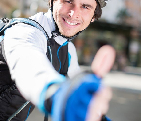 Male Cyclist Showing Thumb Up Sign